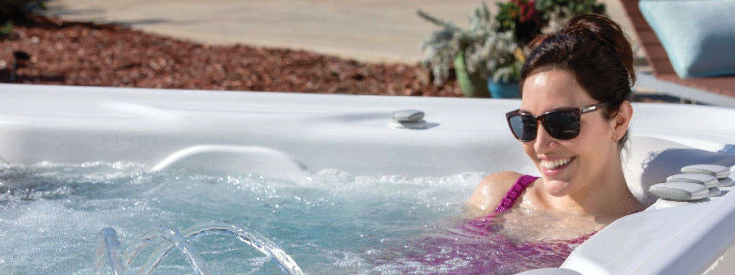 Woman Pleasantly Enjoying Hot Tub