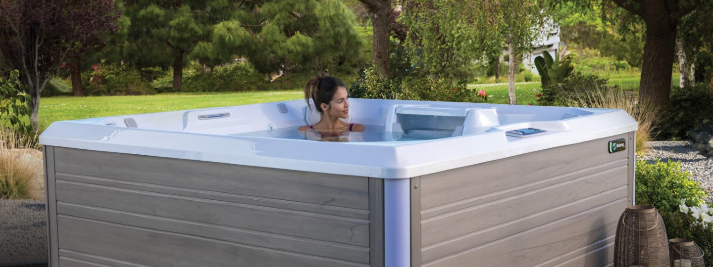 Woman sitting in hot tub