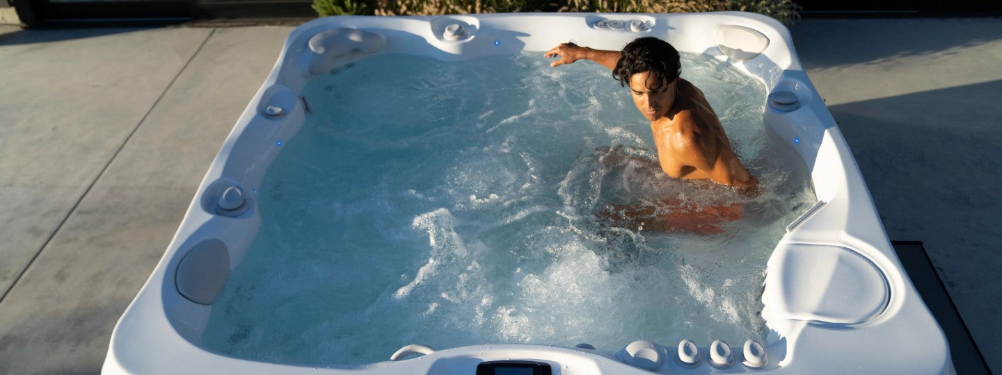 Man in hot tub outside